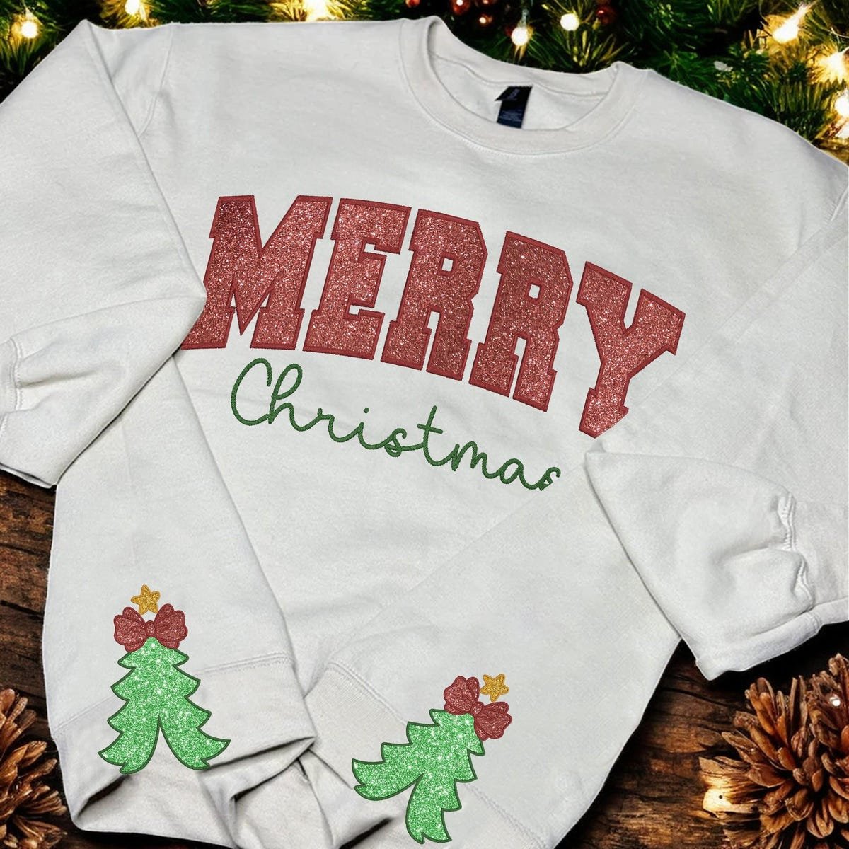 Embroidered Christmas Sweatshirt with Glitter Bow and Tree Design.jpg