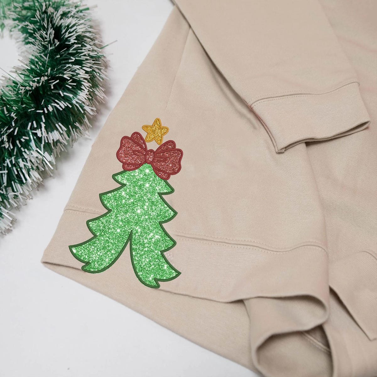 Embroidered Christmas Sweatshirt with Glitter Bow and Tree Design.jpg